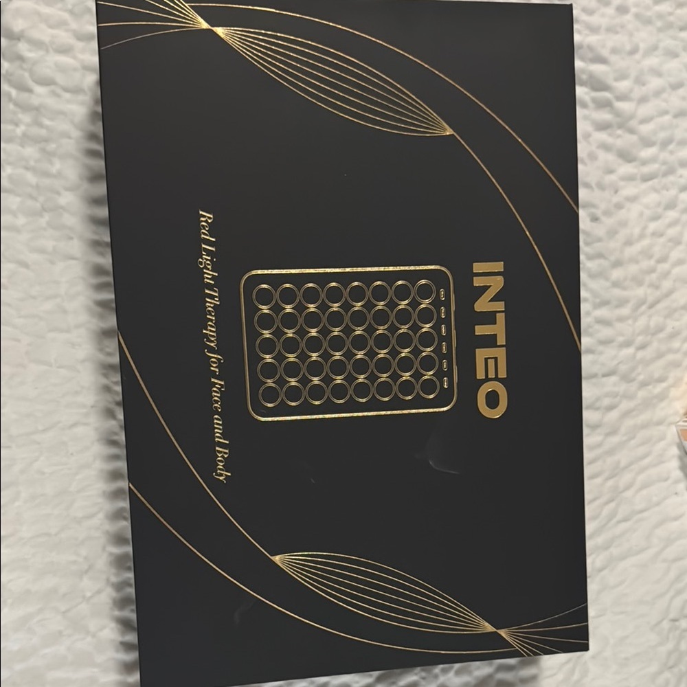 INTEO Black and Gold Light Therapy Device